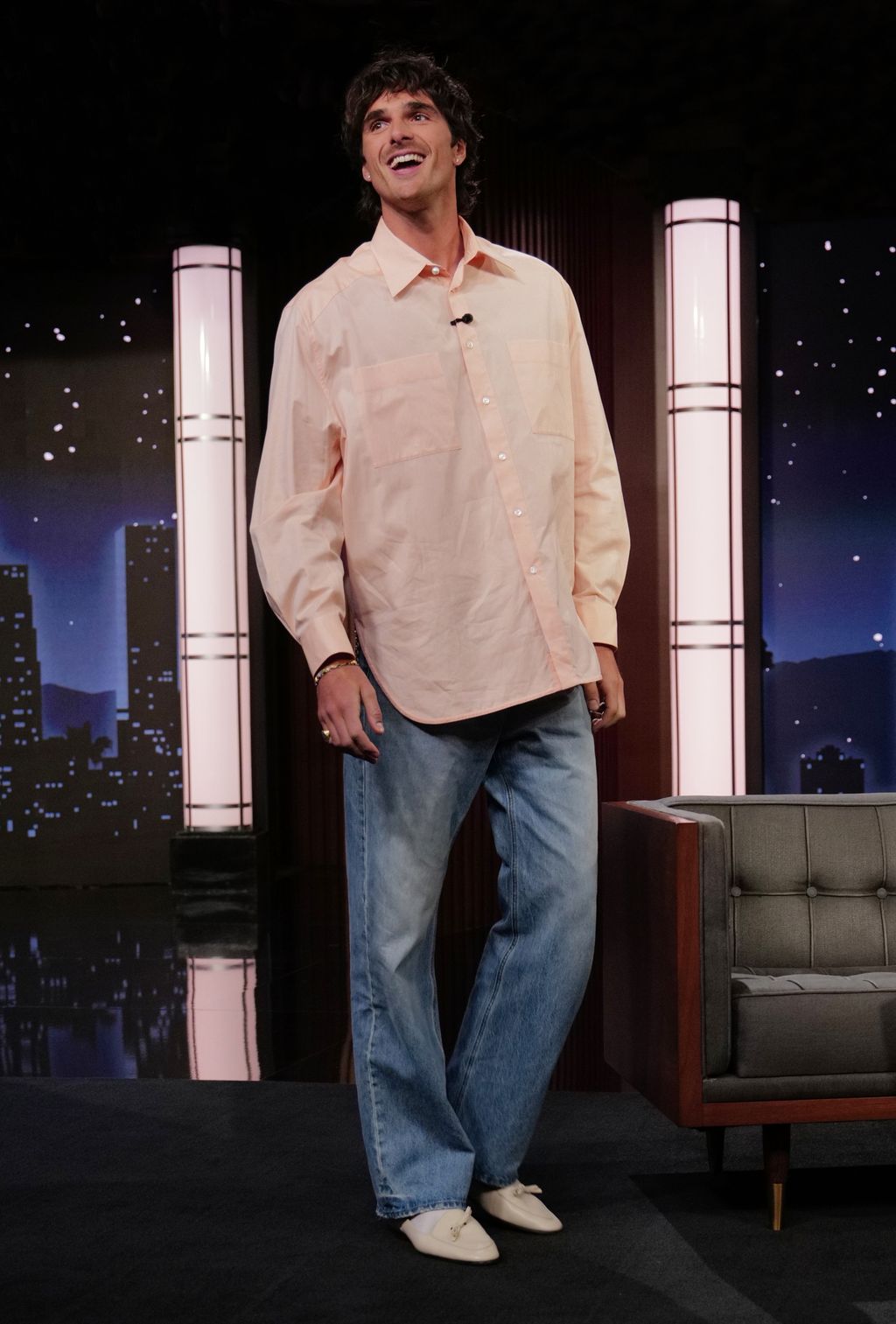 Image may contain Clothing Pants Person Standing Adult Shirt Performer Solo Performance Jeans Head and Face