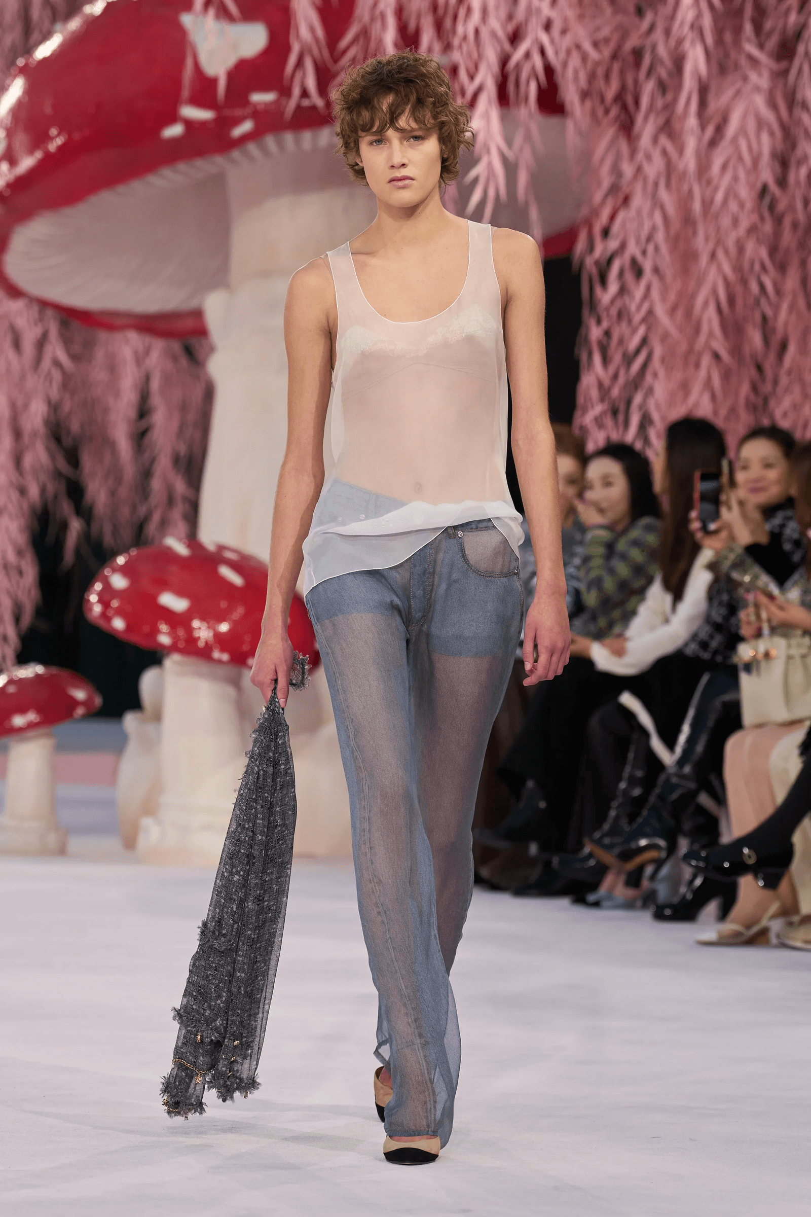 Image may contain Teresa Teng Fashion Clothing Pants Adult Person Jeans Face and Head