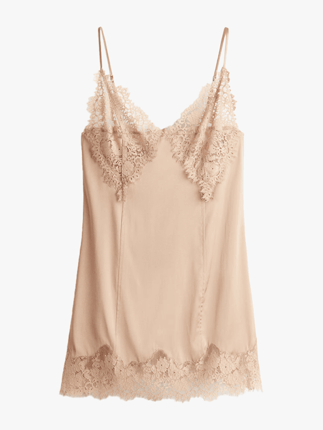 Image may contain Blouse Clothing and Dress