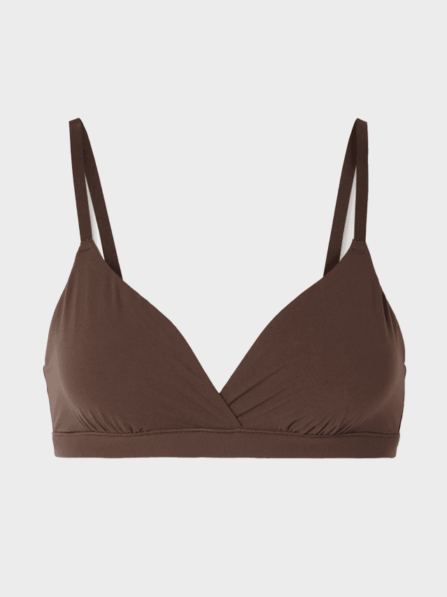 Image may contain: Bra, Clothing, Lingerie, Underwear, Swimwear, and Bikini